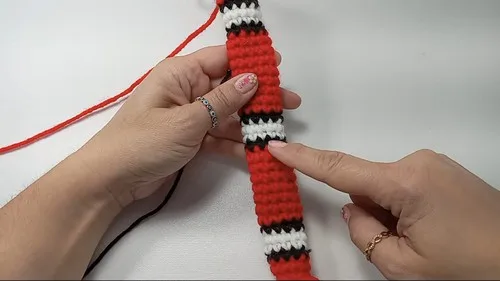 Crochet amigurumi snake fidget with marble rattle — photo 3