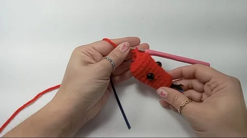 Crochet amigurumi snake fidget with marble rattle — photo 4