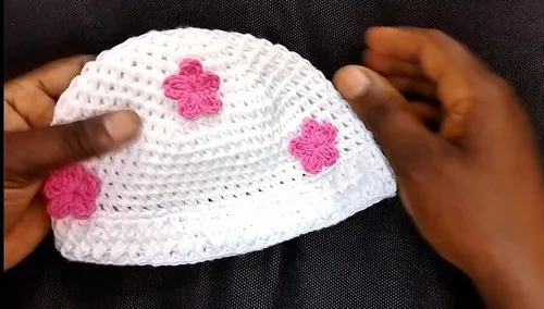 Crochet baby hat pattern with a ribbed brim