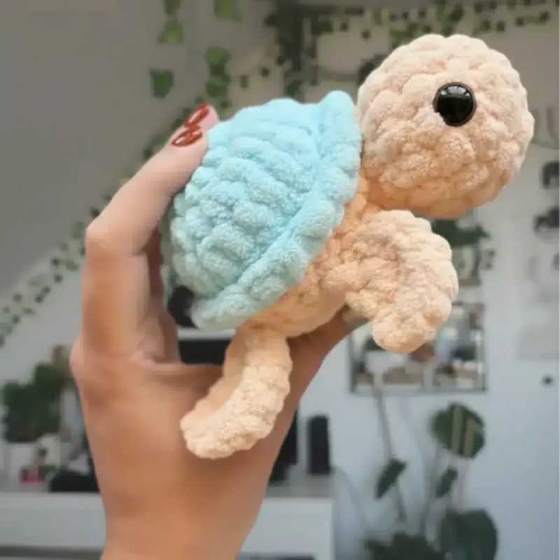 Crochet baby turtle plush pattern with fins and shell — photo 3