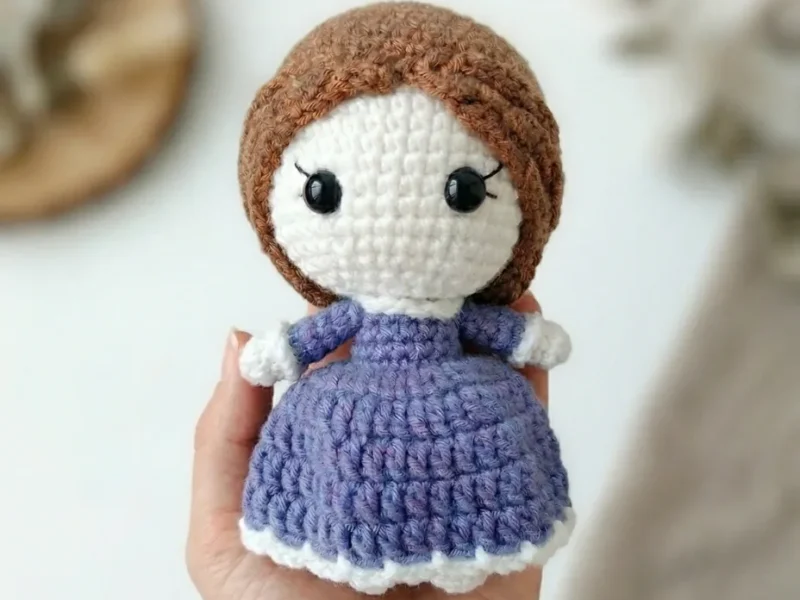 Crochet doll pattern with dress and curly hair