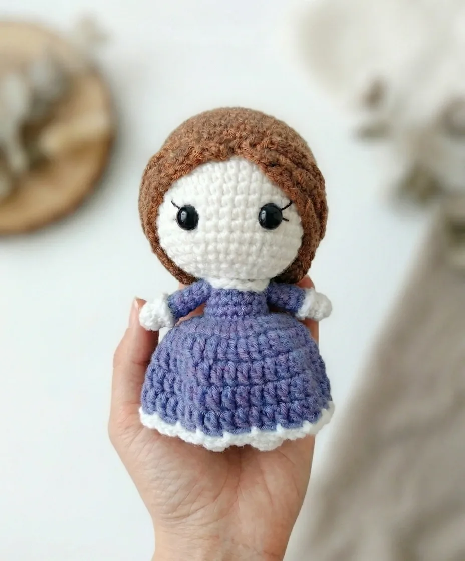 Crochet doll pattern with dress and curly hair
