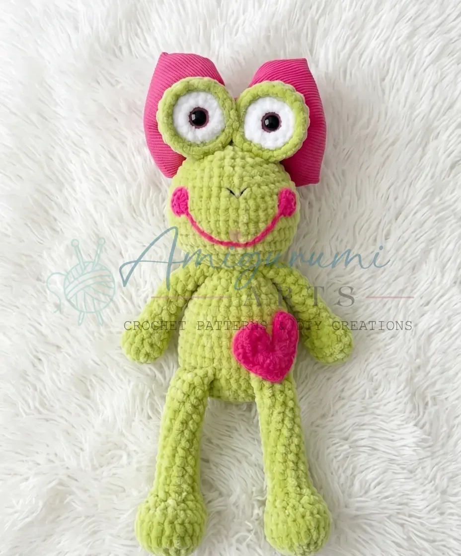 Crochet frog amigurumi with a one-piece body and head