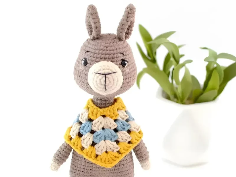 Crochet llama amigurumi with shaped muzzle and ears