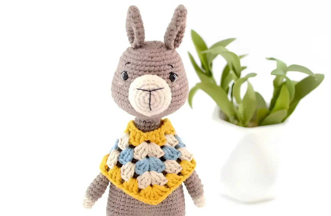 Crochet llama amigurumi with shaped muzzle and ears