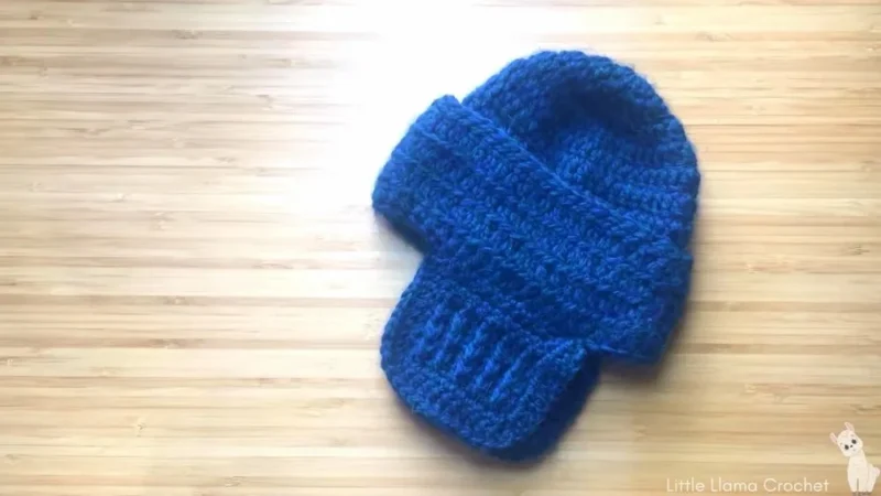 Easy crochet baby hat with ear flaps pattern — photo 2
