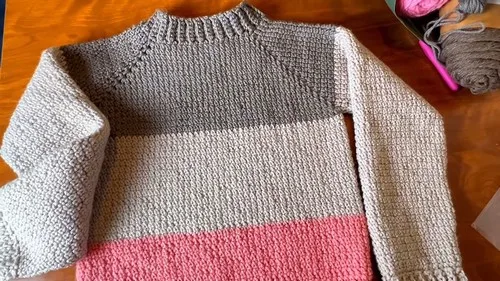 A relaxed-fit crochet pullover top worked in one piece
